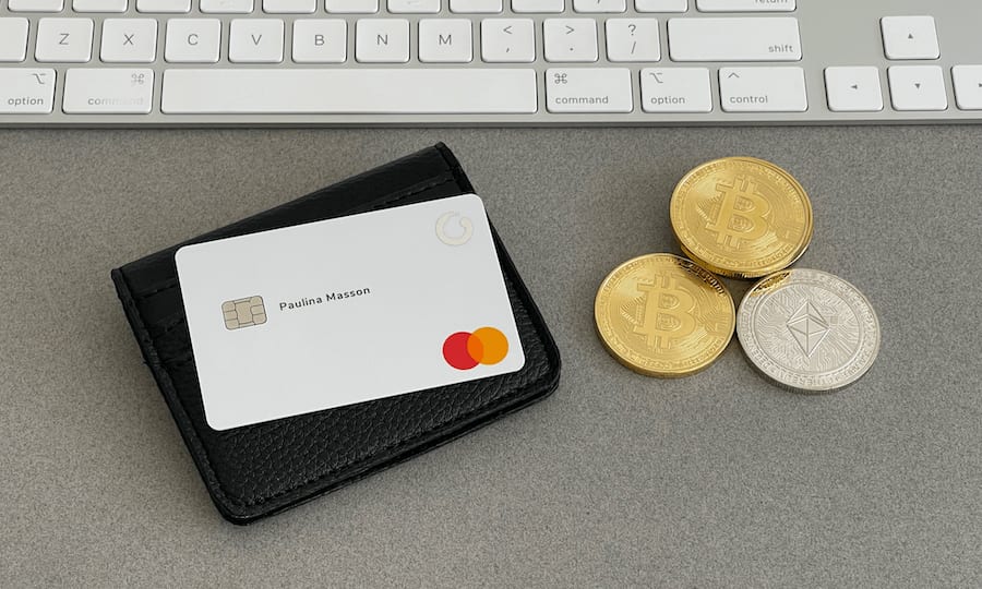 The white ZEN.com Mastercard with the ZEN logo and Mastercard logo